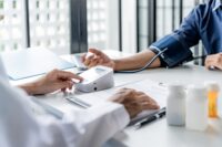 photo of measuring blood pressure in doctor's office